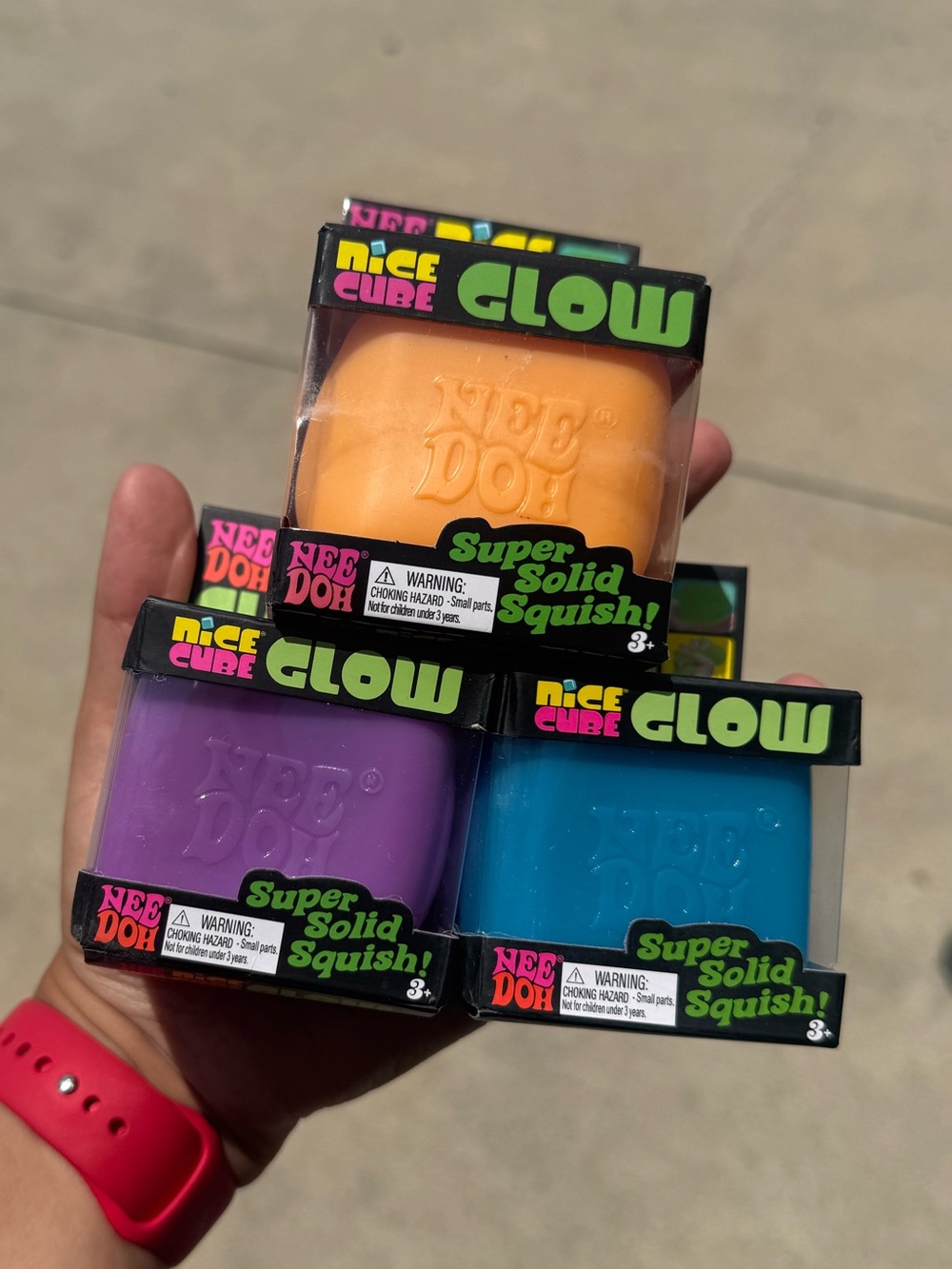 NeeDoh Nice Cube Glow Super Solid Squish - Orange, Purple, Blue